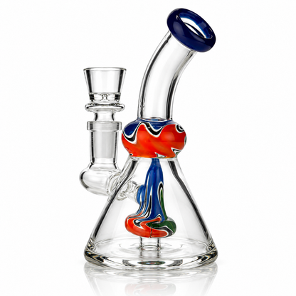 Clear glass beaker water pipe with a curved neck, blue bowl, and red, blue, green, and white decorative swirls inside and around the chamber, shown on a white background.