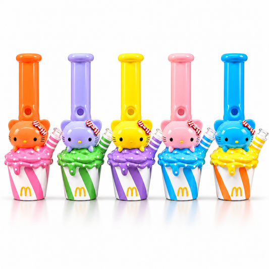 Five colorful cupcake-shaped smoking accessories arranged in a row on a white background, each featuring a Hello Kitty face on top and different pastel cupcake colors with McDonald's-style golden arches.